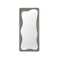 Miroir corporel avec cadre ondulé vert